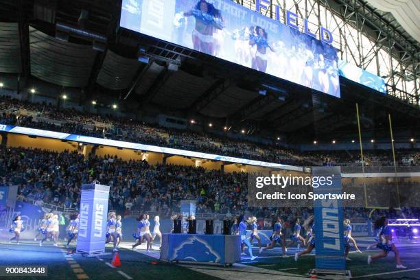 The Detroit Lions cheerleaders dance on to the field before the start of a game between the Green Bay Packers and the Detroit Lions on December 31,...