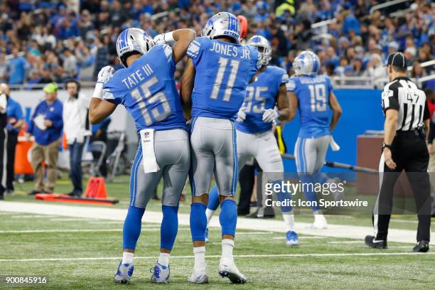 Detroit Lions wide receiver Golden Tate and Detroit Lions wide receiver Marvin Jones Jr. Celebrate a touchdown during a game between the Green Bay...