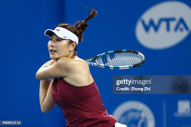 Yingying Duan of China returns a shot during the match against Simona Halep of Romania during Day 4 of 2018 WTA Shenzhen Open at Longgang...