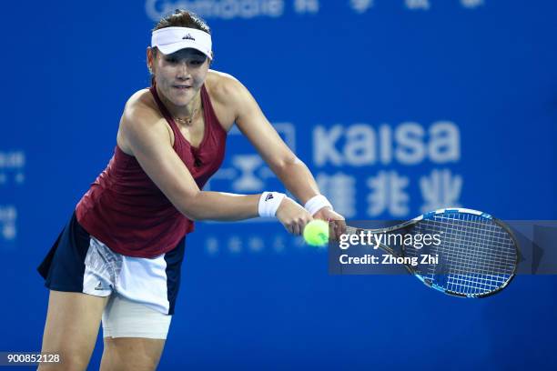 Yingying Duan of China returns a shot during the match against Simona Halep of Romania during Day 4 of 2018 WTA Shenzhen Open at Longgang...