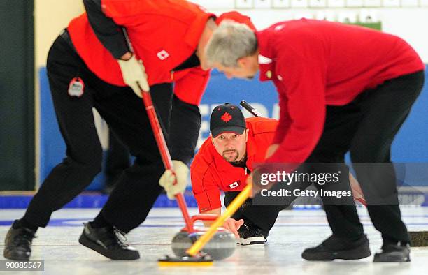 Trevor Baker of Canada competes in the Men's Curling during day five of the Winter Games NZ at Maniototo Ice Rink on August 26, 2009 in Naseby, New...