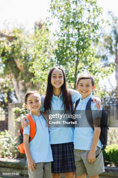 school children leaving the house - first day of school australia stock pictures, royalty-free photos & images