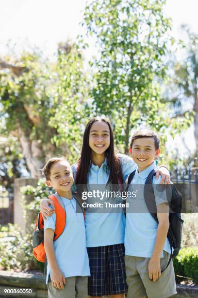 school children leaving the house - first day of school australia stock pictures, royalty-free photos & images