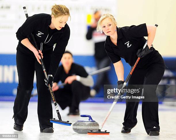 Marisa Jones and Brydie Donald of New Zealand compete in the Men's Curling during day five of the Winter Games NZ at Maniototo Ice Rink on August 26,...