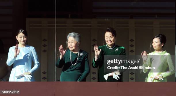 Princess Mako of Akishino, Princess Yuriko of Mikasa, Princess Nobuko of Mikasa and Princess Akiko of Mikasa greet well-wishers from a balcony at the...