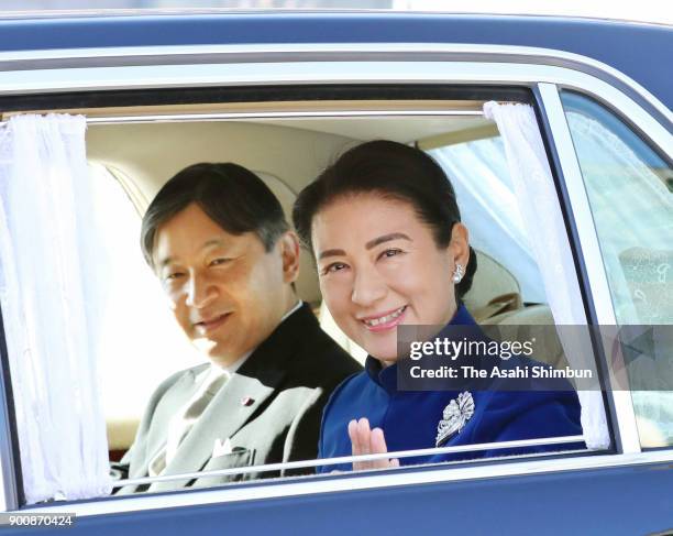 Crown Prince Naruhito and Crown Princess Masako are seen on arrival at the Imperial Palace on January 2, 2018 in Tokyo, Japan.