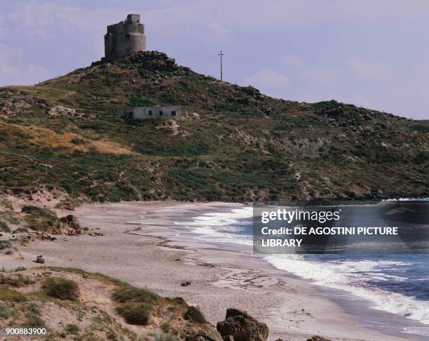 The beach and the tower of San Giovanni in Capo San Marco, Cabras, Sinis Peninsula, Sardinia, Italy.