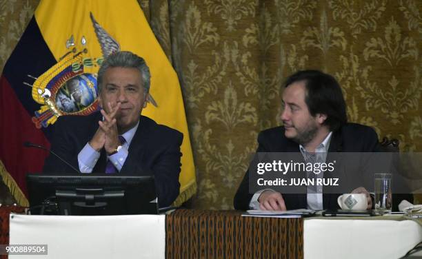 Ecuadoran President Lenin Moreno , sitting next to his new chief adviser Andres Mideros , announces the removal of Vice President Jorge Glas at a...