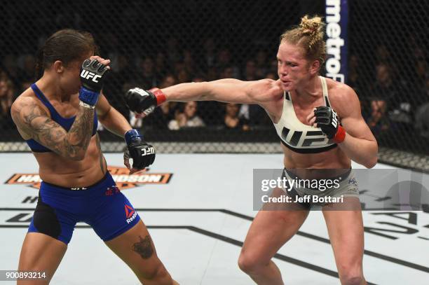 Holly Holm faces Germaine de Randamie in their women's featherweight championship bout during the UFC 208 event inside Barclays Center on February...