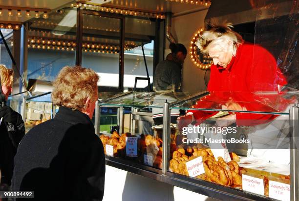 olibollen time in netherlands - market stall stock pictures, royalty-free photos & images