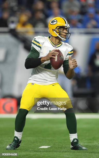 Brett Hundley of the Green Bay Packers drops back to pass during the third quarter of the game against the Detroit Lions at Ford Field on December...