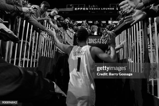 Devin Booker of the Phoenix Suns walks off the court through the tunnel after the game against the Atlanta Hawks on January 2, 2018 at Talking Stick...