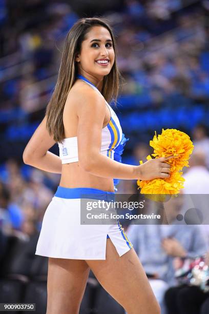 Cheerleader performs during an college basketball game between the Cincinnati Bearcats and the UCLA Bruins on December 16 at Pauley Pavilion in Los...