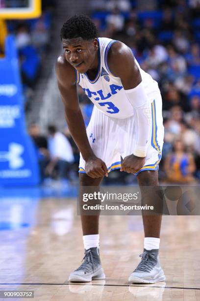 Guard Aaron Holiday looks on during an college basketball game between the Cincinnati Bearcats and the UCLA Bruins on December 16 at Pauley Pavilion...