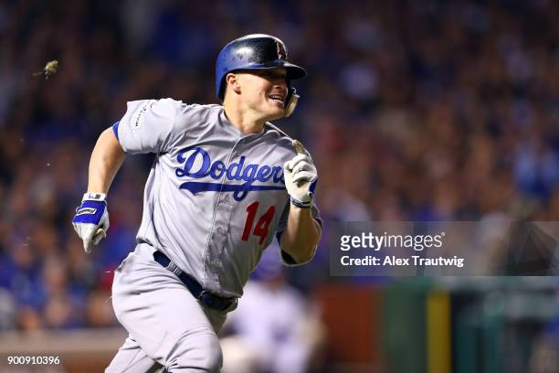 Enrique Hernandez of the Los Angeles Dodgers hits a home run during Game 5 of the National League Championship Series against the Chicago Cubs at...