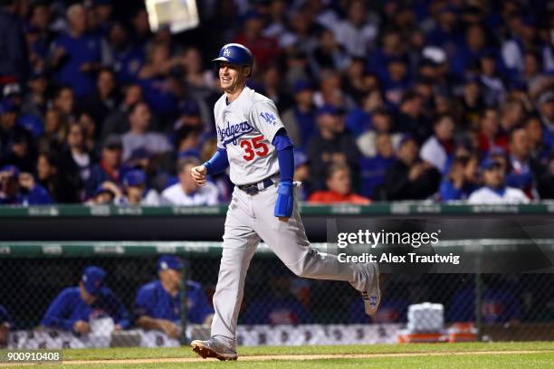 Cody Bellinger reacts after Enrique Hernandez of the Los Angeles Dodgers hit a home run during Game 5 of the National League Championship Series...