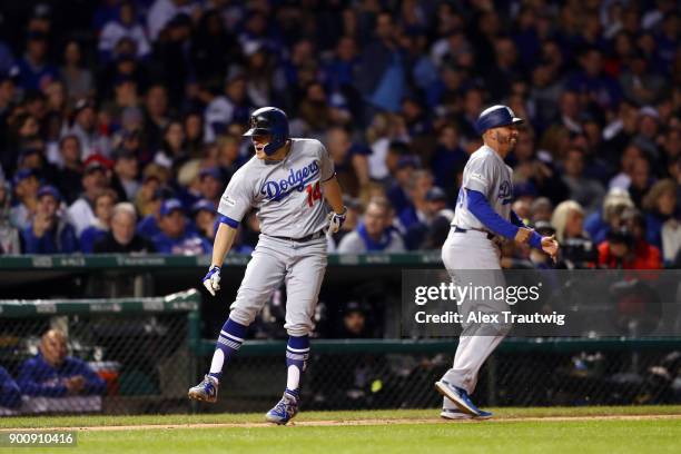 Enrique Hernandez of the Los Angeles Dodgers celebrates after hitting a home run during Game 5 of the National League Championship Series against the...