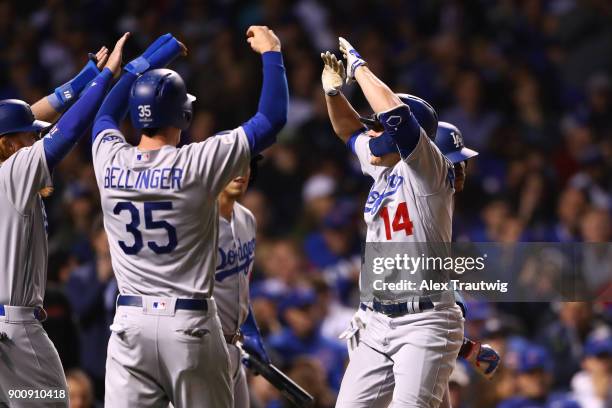 Enrique Hernandez of the Los Angeles Dodgers celebrates after hitting a home run during Game 5 of the National League Championship Series against the...