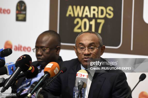 President of Confederation of African Football Ahmad Ahmad speaks next to the first vice-president Kwesi Nyantakyi, during a press conference on the...