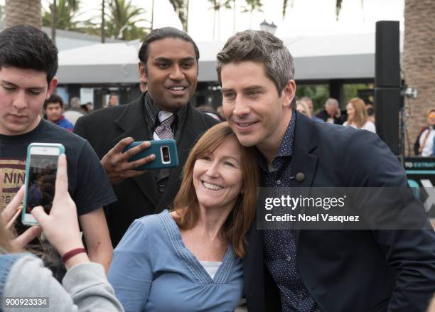 Arie Luyendyk takes a selfie with fans at "Extra" at Universal Studios Hollywood on January 3, 2018 in Universal City, California.