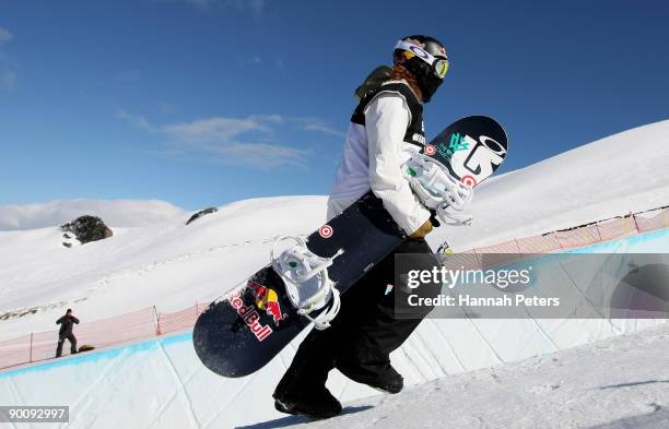 Shaun White of the United States of America walks on the edge of the halfpipe during the the Men's Snowboard Halfpipe final during day five of the...