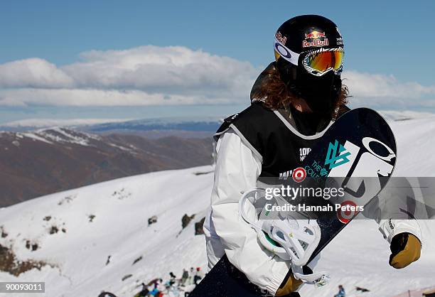 Shaun White of the United States of America walks on the edge of the halfpipe during the the Men's Snowboard Halfpipe final during day five of the...