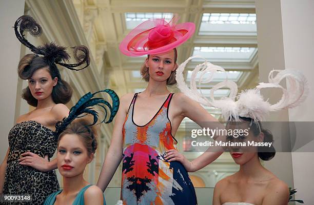 Models showcase dresses designed by Lisa Ho, Leona Edmiston, Manning Cartell and Akira with headpieces by Paris Kyne Master Milliner at the launch of...