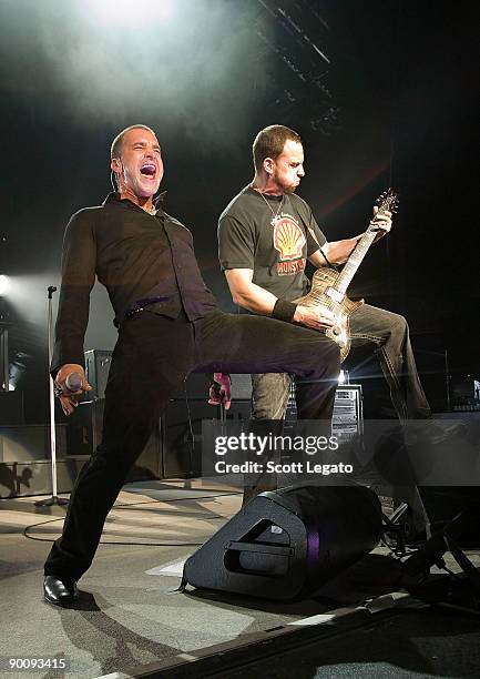 Scott Stapp and Mark Tremonti of Creed perform at the DTE Energy Center on August 25, 2009 in Clarkston, Michigan.