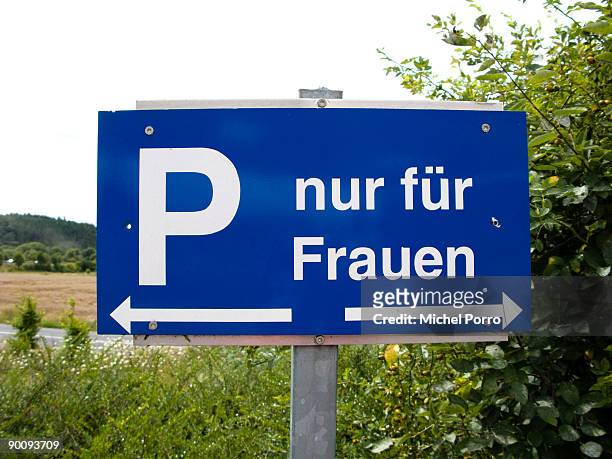 Sign indicates a parking spot intended for women only near the entrance of a highway gas station on July 30, 2009 near Frankfurt, Germany. Especially...