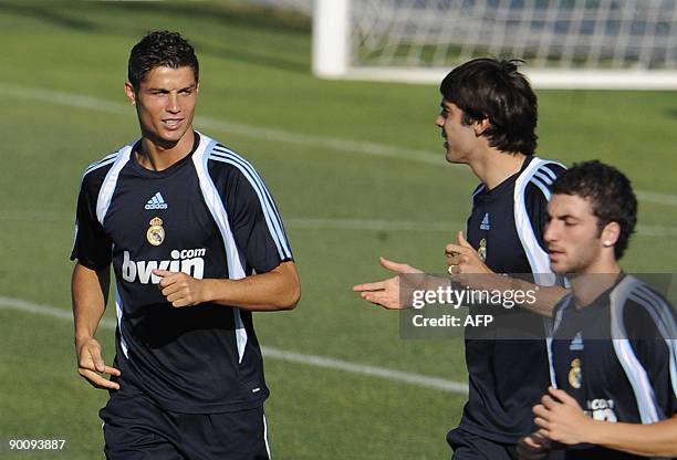 Real Madrid's Portuguese forward Cristiano Ronaldo and Brazilian midfielder Kaka take part in a training session at the Real Madrid sport city in...