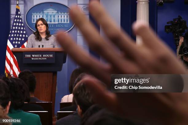 White House Press Secretary Sarah Huckabee Sanders conducts a news conference in the Brady Press Briefing Room at the White House January 3, 2018 in...