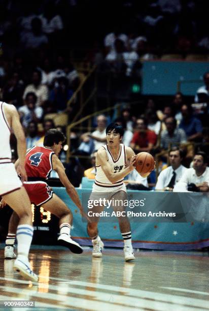 Los Angeles, CA Steve Alford, Fengwu Sun, Men's Basketball preliminaries competition at the 1984 Summer Olympics, July 29, 1984.