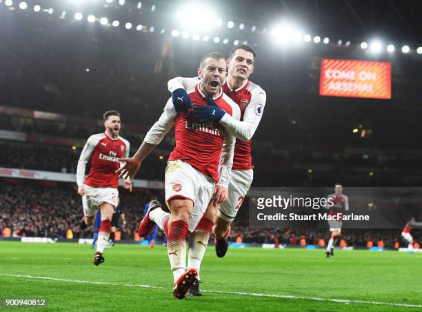Arsenal's Jack Wilshere celebrates his goal with Grait Xhaka during the Premier League match between Arsenal and Chelsea at Emirates Stadium on...