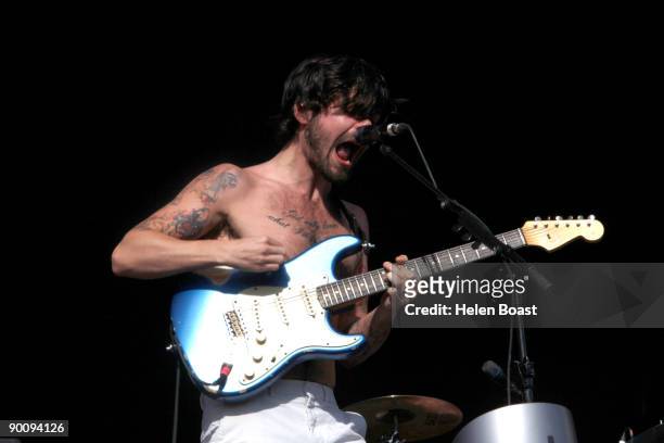 Simon Neil of Biffy Clyro performs on stage on the second day of V Festival at Hylands Park on August 23, 2009 in Chelmsford, England.
