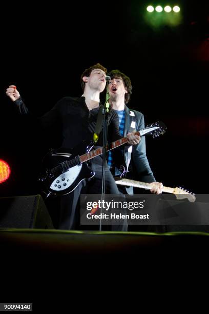 Nathan Connolly and Gary Lightbody of Snow Patrol perform on stage on the second day of V Festival at Hylands Park on August 23, 2009 in Chelmsford,...