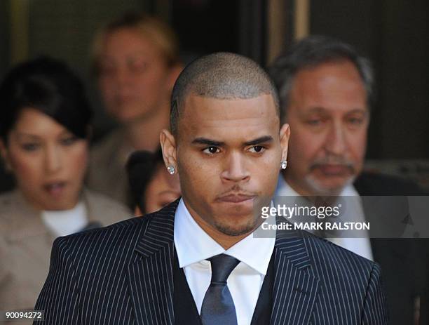 Singer Chris Brown leaves the Los Angeles Superior Court after sentencing in his felony assault case against fellow singer and former girlfriend...