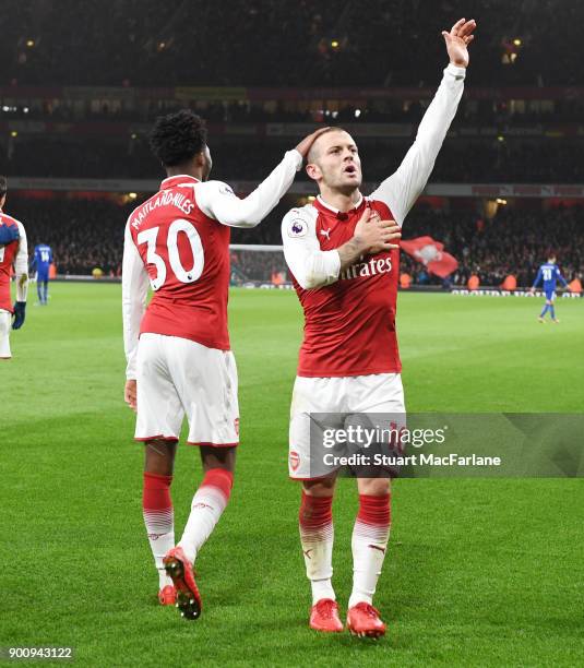Jack Wilshere celebrates scoring for Arsenal during the Premier League match between Arsenal and Chelsea at Emirates Stadium on January 3, 2018 in...