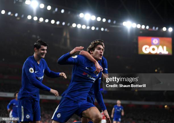 Marcos Alonso of Chelsea celebrates scoring his sides second goal with Danny Drinkwater of Chelsea during the Premier League match between Arsenal...