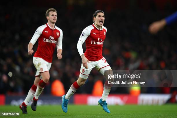 Hector Bellerin of Arsenal celebrates after scoring his sides second goal during the Premier League match between Arsenal and Chelsea at Emirates...