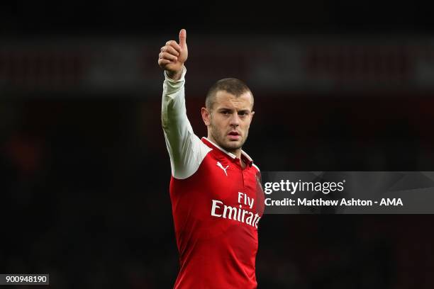 Jack Wilshere of Arsenal salutes the fans at the end of the Premier League match between Arsenal and Chelsea at Emirates Stadium on January 3, 2018...