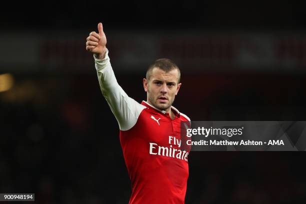 Jack Wilshere of Arsenal salutes the fans at the end of the Premier League match between Arsenal and Chelsea at Emirates Stadium on January 3, 2018...