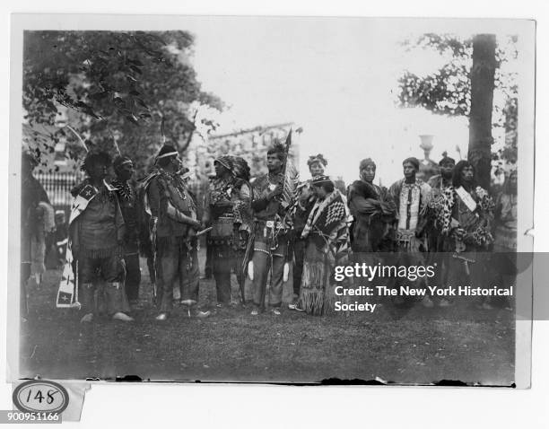 Group of Iroquois in native dress, Hudson-Fulton Land Parade, at Columbia Lawn Fete, 1909.