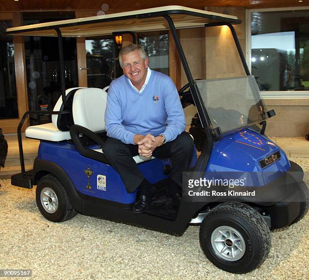 Colin Montgomerie of Scotland is presented with his Capain's Golf Buggy by Club Car at Gleneagles on August 26, 2009 in Auchterarder, Scotland.