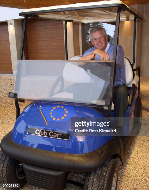 Colin Montgomerie of Scotland is presented with his Capain's Golf Buggy by Club Car at Gleneagles on August 26, 2009 in Auchterarder, Scotland.