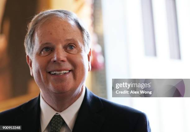 Sen. Doug Jones during a meeting with Senate Minority Leader Sen. Chuck Schumer at the U.S. Capitol January 3, 2018 in Washington, DC. Sen. Tina...