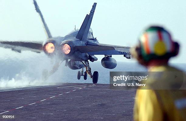 An F/A-18 "Hornet" from Fighter Attack Squadron 192 "Golden Dragons," part of Carrier Air Wing 5, launches December 2, 2001 from the flight deck of...