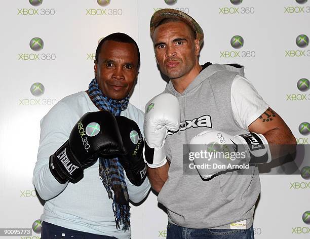 Australian boxer Anthony Mundine squares up to five times world champion former boxer Sugar Ray Leonard to launch Xbox 360 and EA Sports' "Fight...