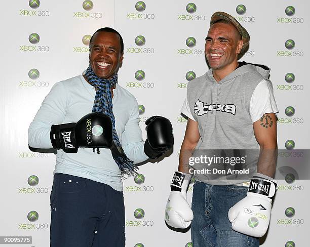 Australian boxer Anthony Mundine squares up to five times world champion former boxer Sugar Ray Leonard to launch Xbox 360 and EA Sports' "Fight...