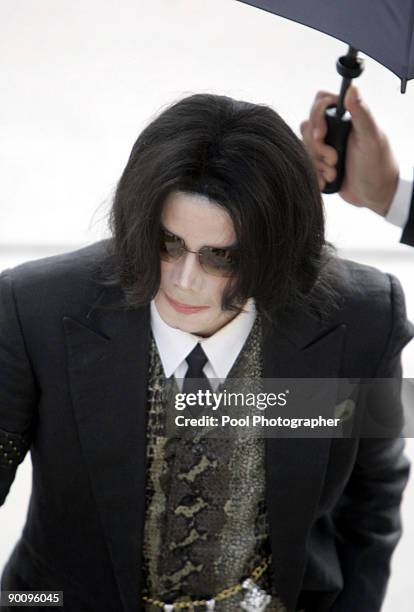 Michael Jackson arrives at the courthouse for another day in his child molestation trial at Santa Barbara County Superior Court on March 9, 2005 in...