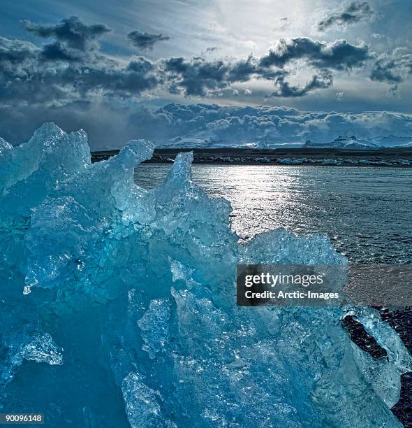 ice on beach,  jokulsarlon glacial lagoon - breidamerkurjokull glacier stock pictures, royalty-free photos & images